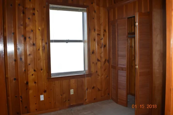 a kitchen with a sink and a window
