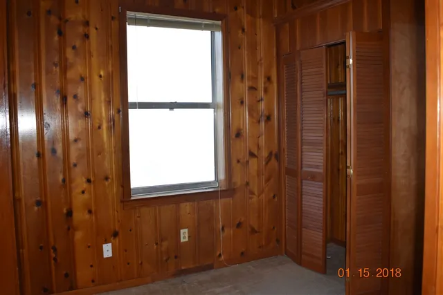 a kitchen with a sink and a window