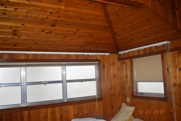 a view of a livingroom with furniture and window