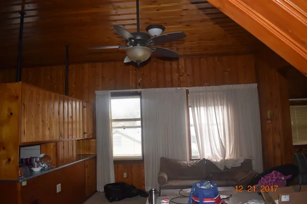 a bathroom with a mirror and a shower