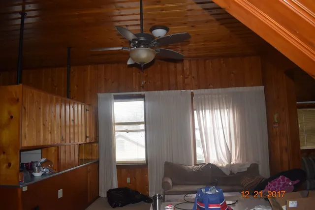 a bathroom with a mirror and a shower