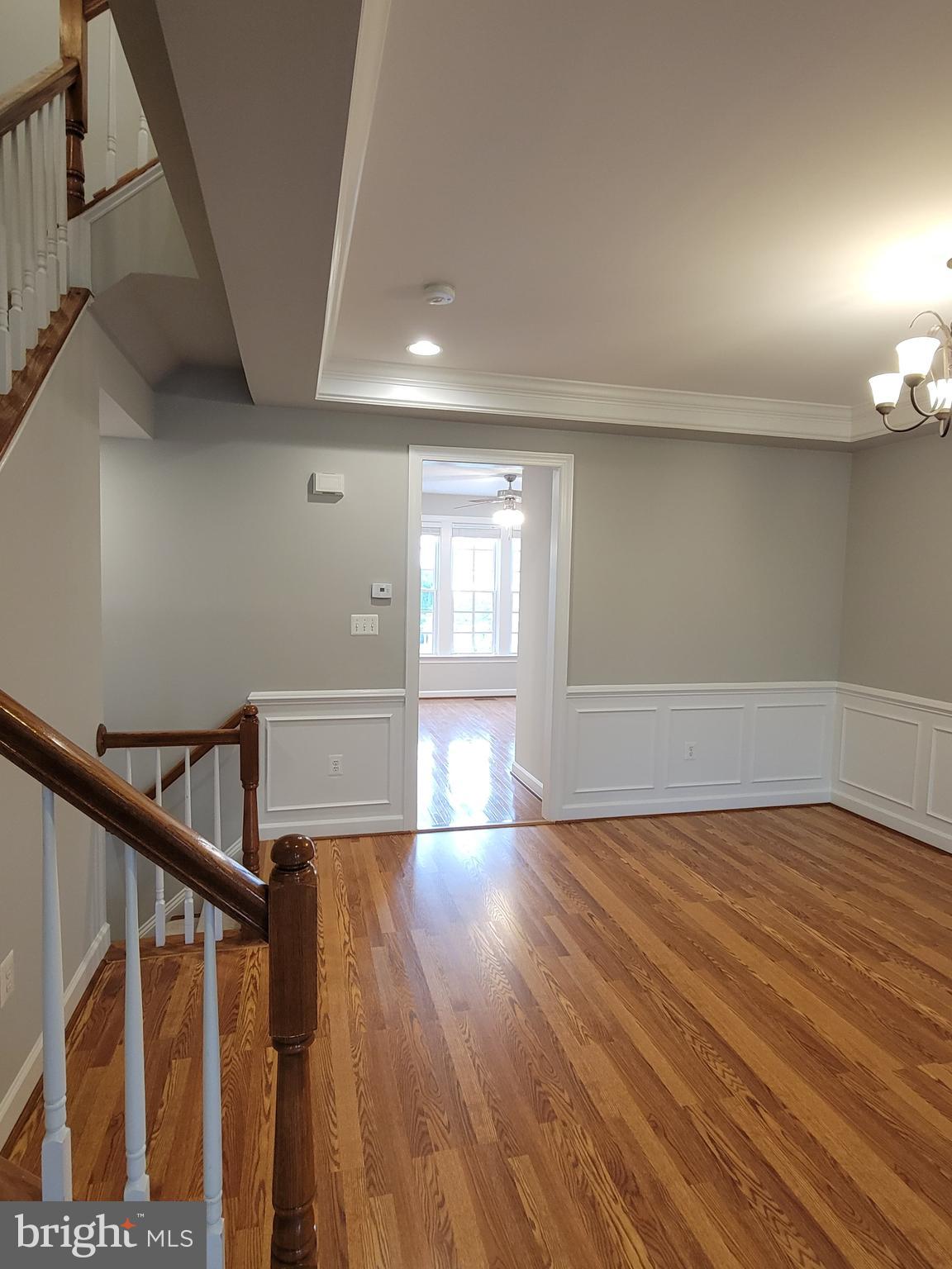 11837 Whitworth Cannon Lane Bristow, VA 20136 - Photo 17 of 63 a view of empty room with wooden floor