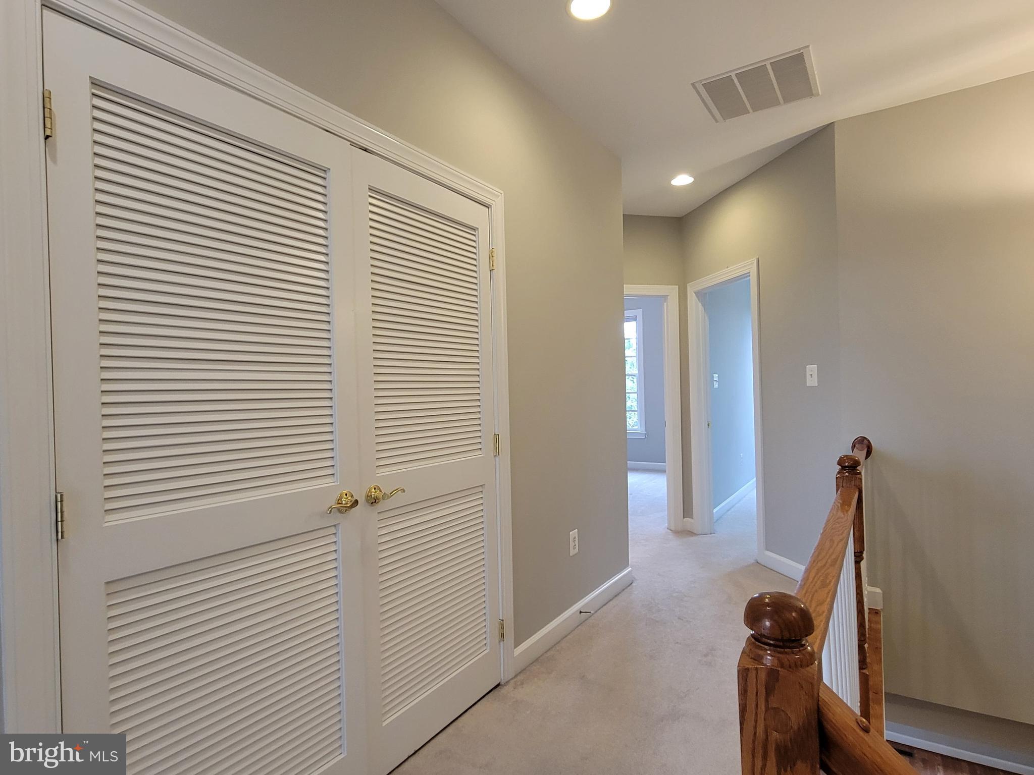 11837 Whitworth Cannon Lane Bristow, VA 20136 - Photo 36 of 63 a view of a hallway with workspace