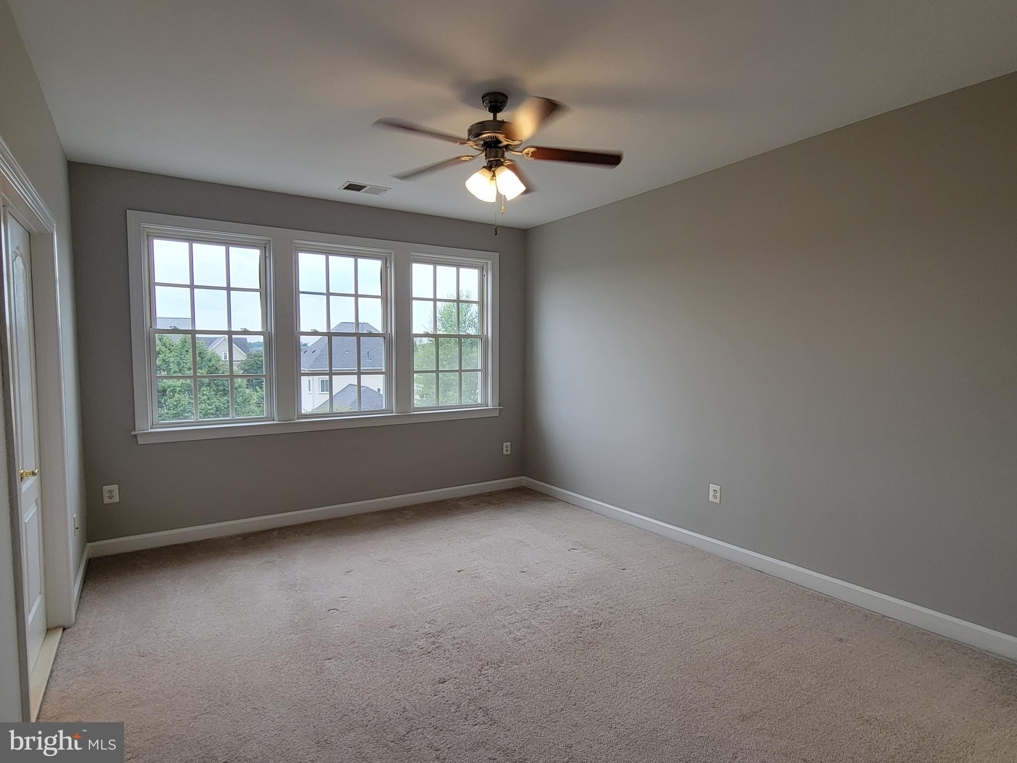 11837 Whitworth Cannon Lane Bristow, VA 20136 - Photo 53 of 63 wooden floor in an empty room with a window
