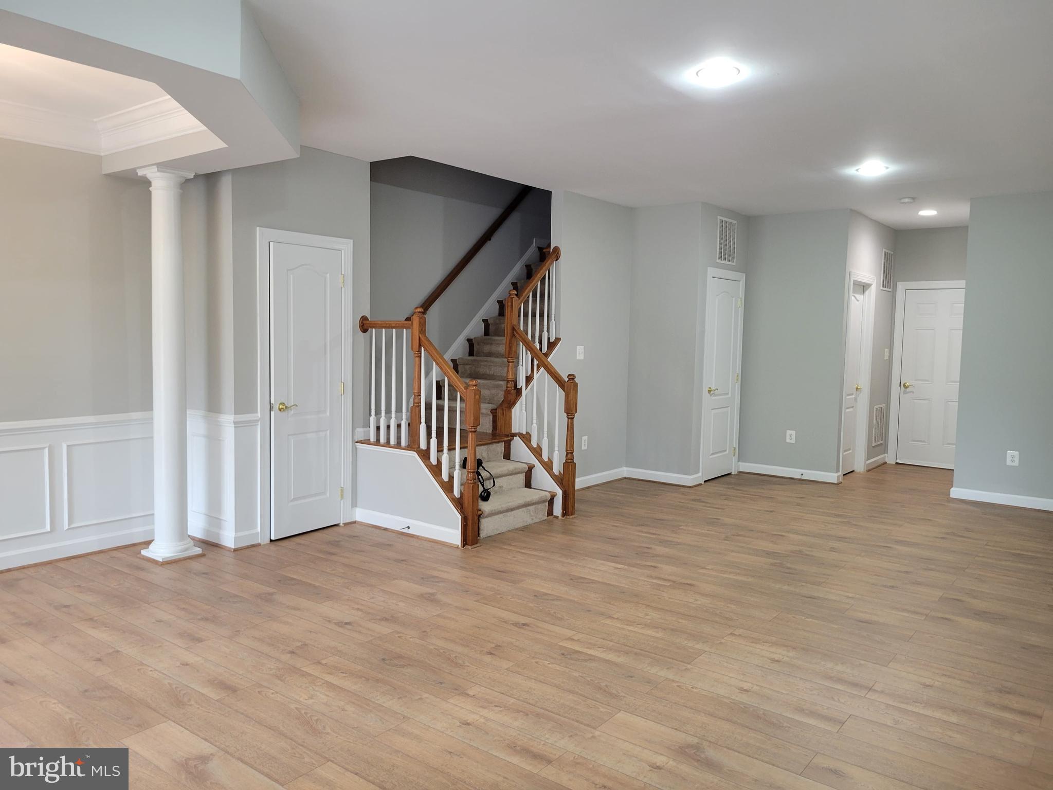 11837 Whitworth Cannon Lane Bristow, VA 20136 - Photo 8 of 63 a view of an empty room with staircase