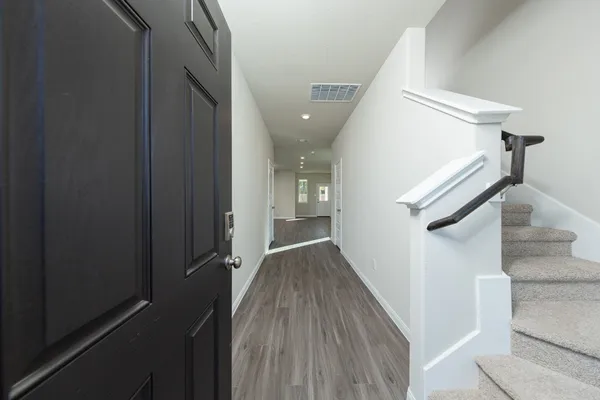 a view of hallway with stairs