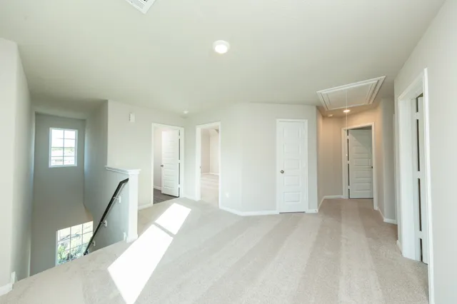 a view of livingroom with hardwood floor and hallway