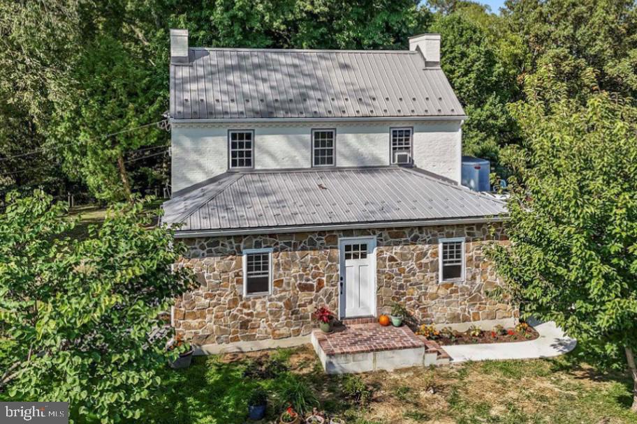 990 Chesterville Road Oxford, PA 19363 - Photo 1 of 14 a house view with a sitting space and garden