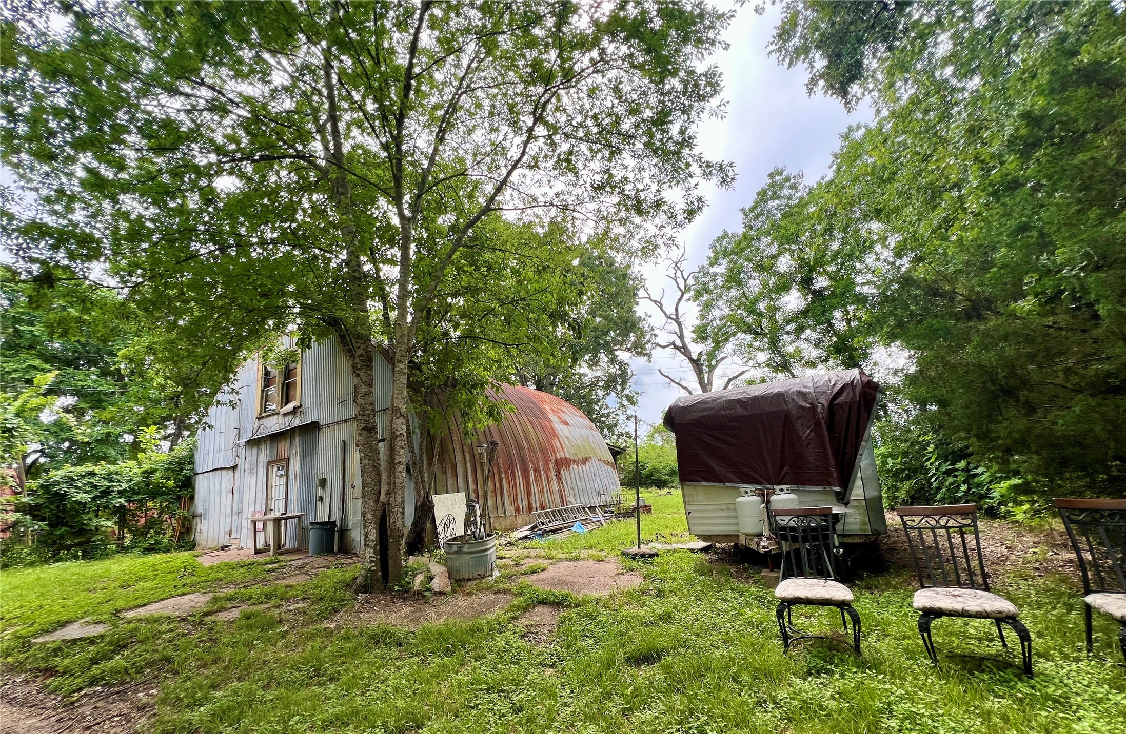22606 Farm To Market 359 Hempstead, TX 77445 - Photo 21 of 26 a garden view with a seating space