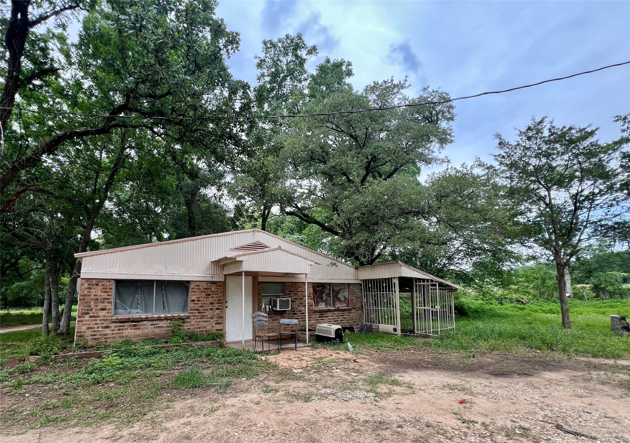 22606 Farm To Market 359 Hempstead, TX 77445 - Photo 4 of 26 a view of a house with a yard