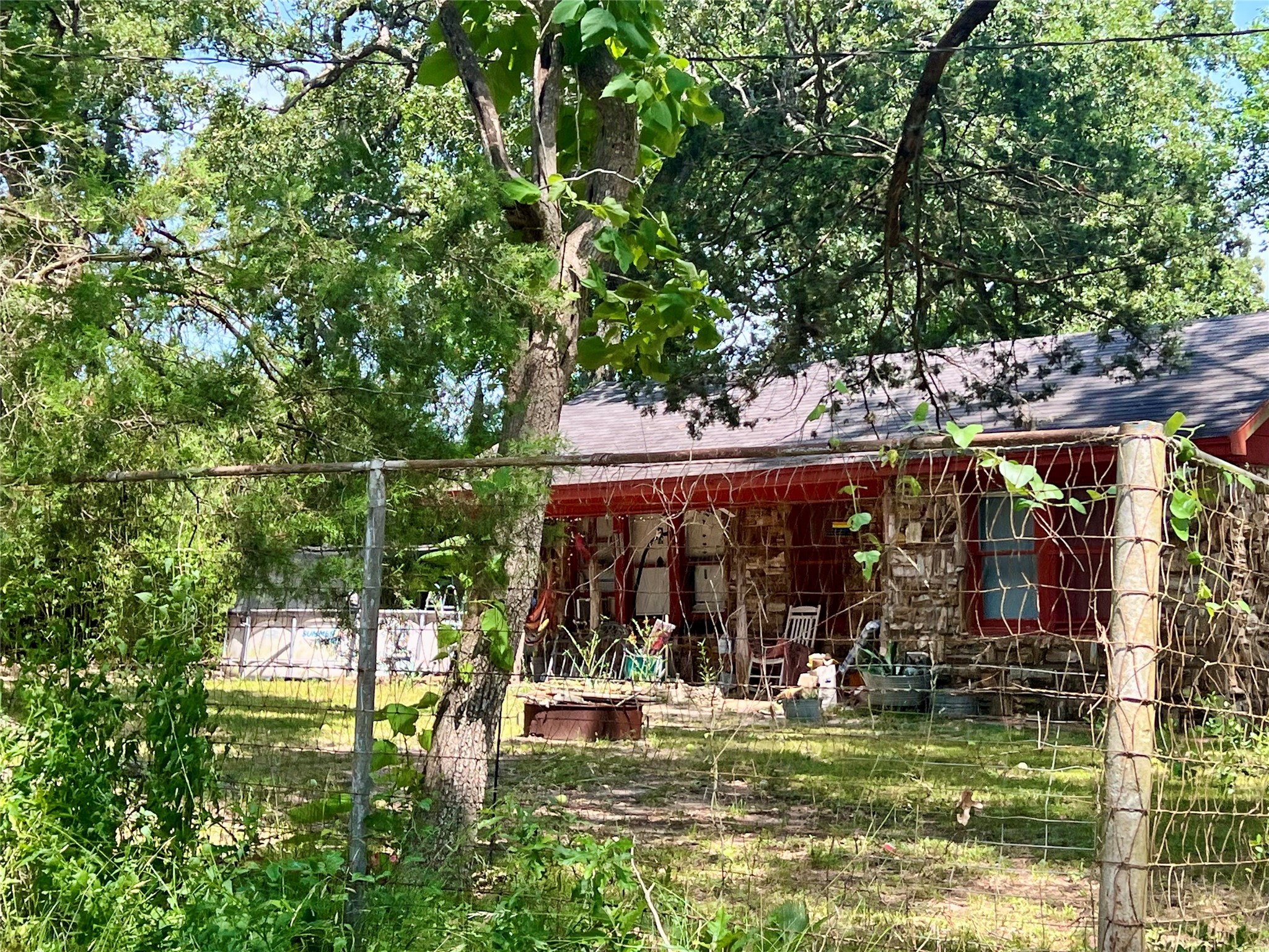 22606 Farm To Market 359 Hempstead, TX 77445 - Photo 7 of 26 a view of a chairs and table in a patio