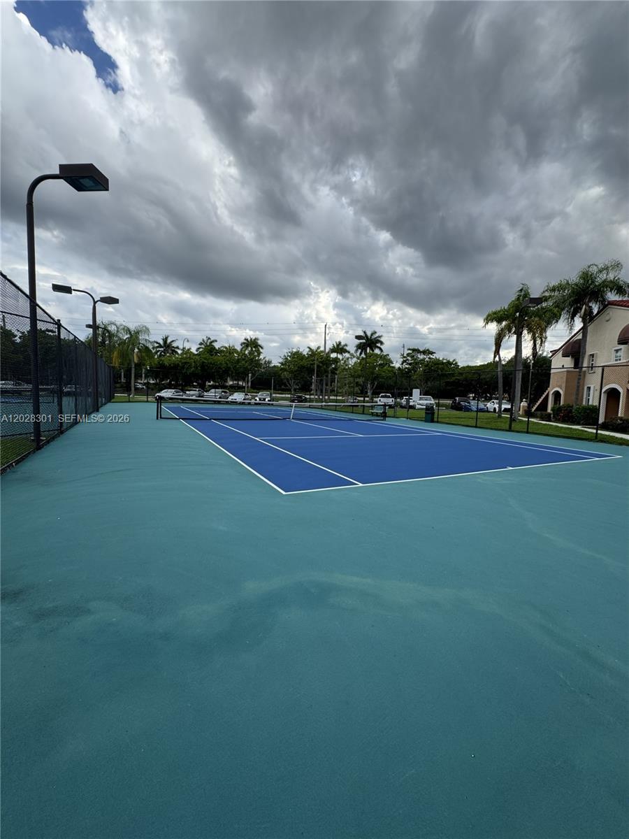 2021 Renaissance Boulevard, Unit 201 Miramar, FL 33025 - Photo 20 of 26 a view of a basket ball ground