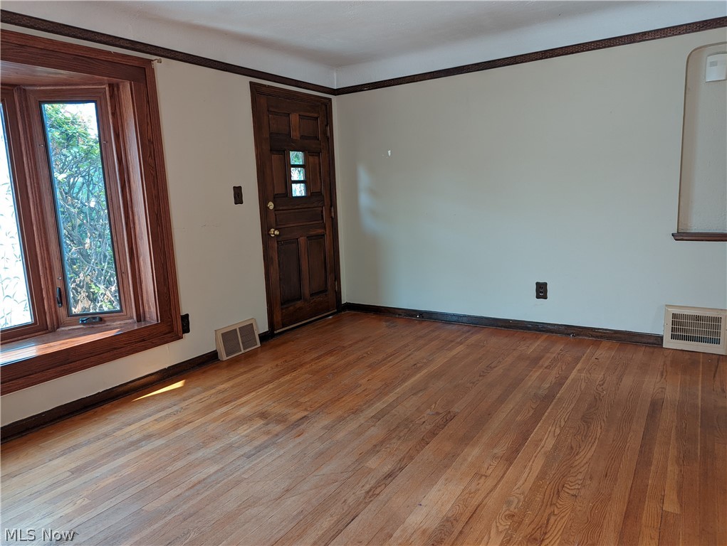 13817 Granger Road Cleveland, OH 44125 - Photo 3 of 22 Another view of living room
