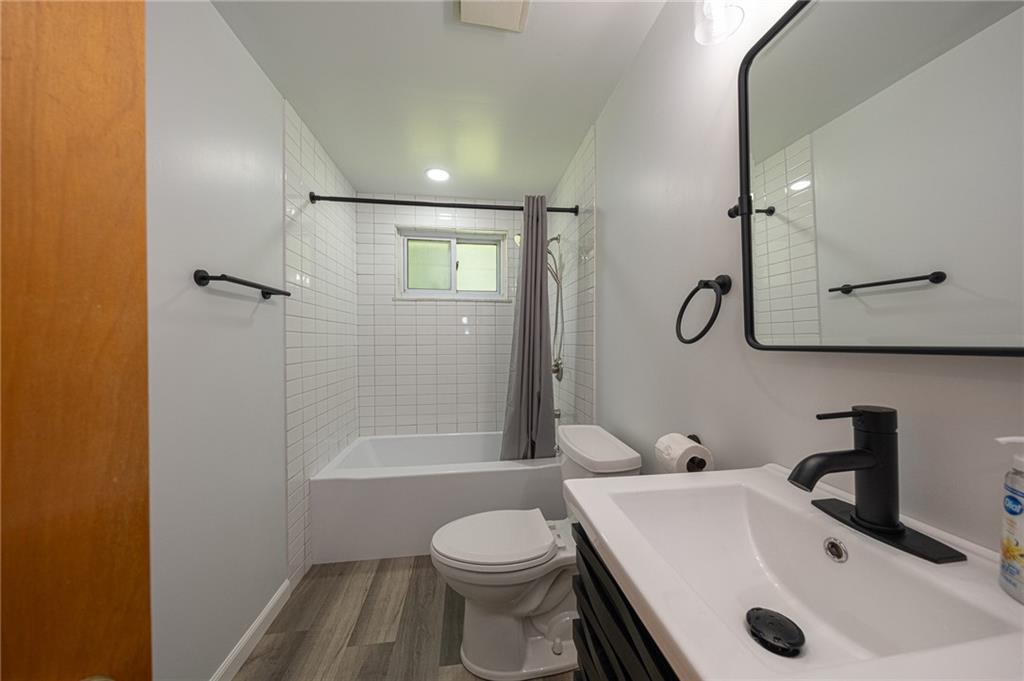 244 Herbst Road Coraopolis, PA 15108 - Photo 13 of 35 Updated main bath is light and bright with all new fixtures.