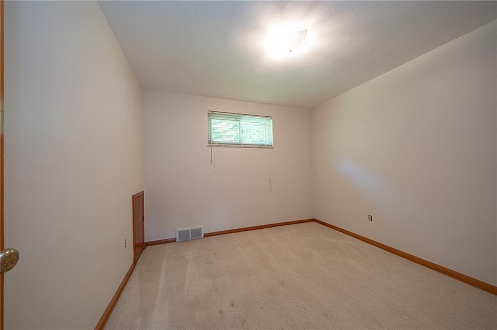 244 Herbst Road Coraopolis, PA 15108 - Photo 22 of 35 Bedroom 2 with hardwood floors under the carpet.