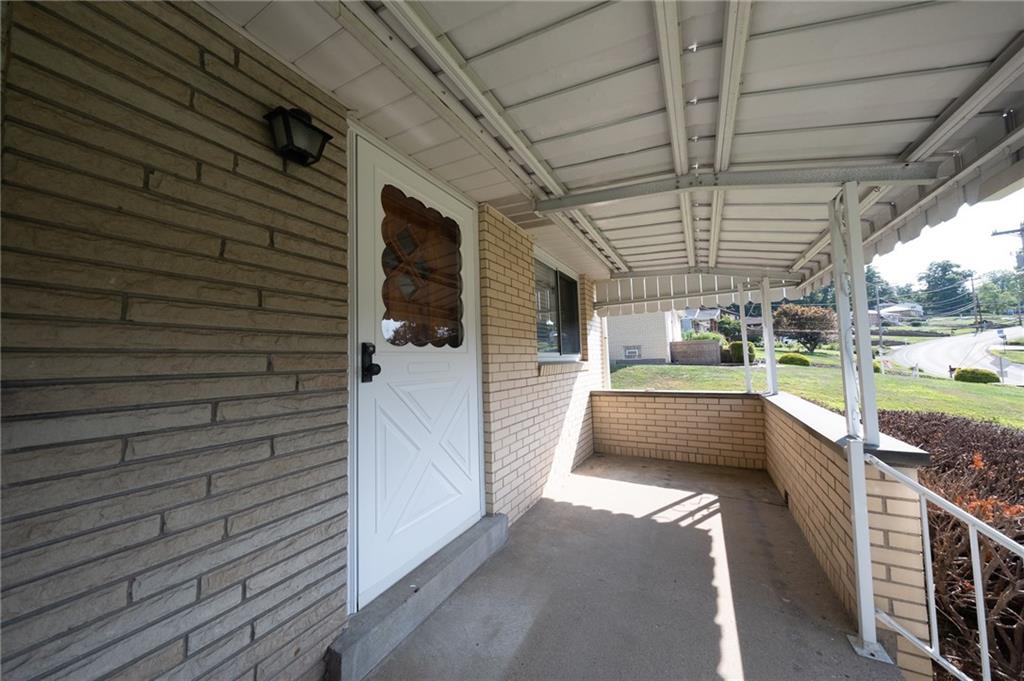244 Herbst Road Coraopolis, PA 15108 - Photo 5 of 35 Cozy covered front porch that is far from the main road for privacy.