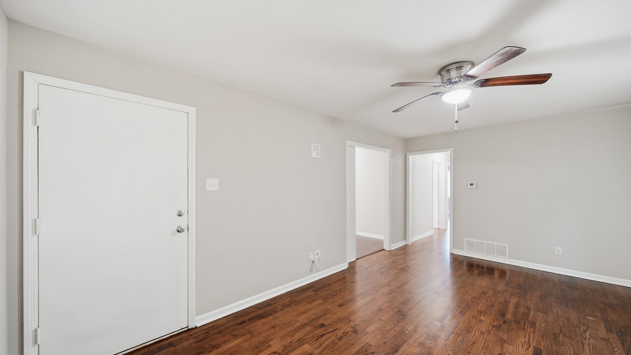 3531 Randolph Street Memphis, TN 38127 - Photo 14 of 32 a view of empty room with wooden floor