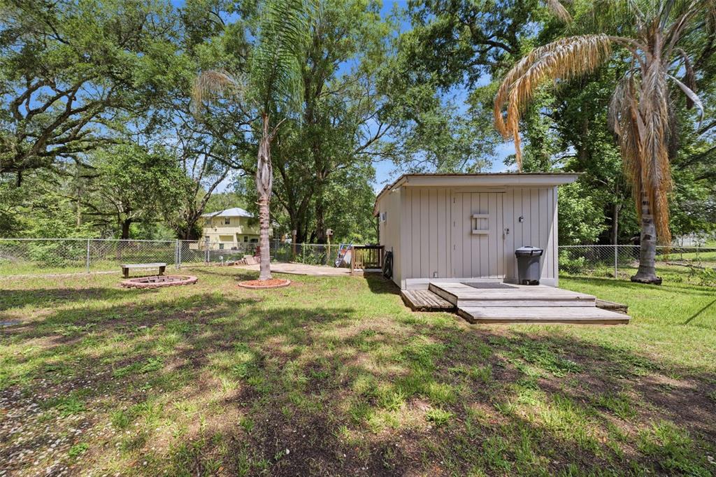 3183 Cedley Road Dade City, FL 33523 - Photo 23 of 48 a view of a house with a yard and tree