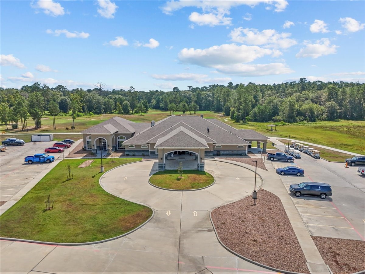 20061 Torrey Pines Lane Cleveland, TX 77327 - Photo 38 of 41 a view of a swimming pool with a patio