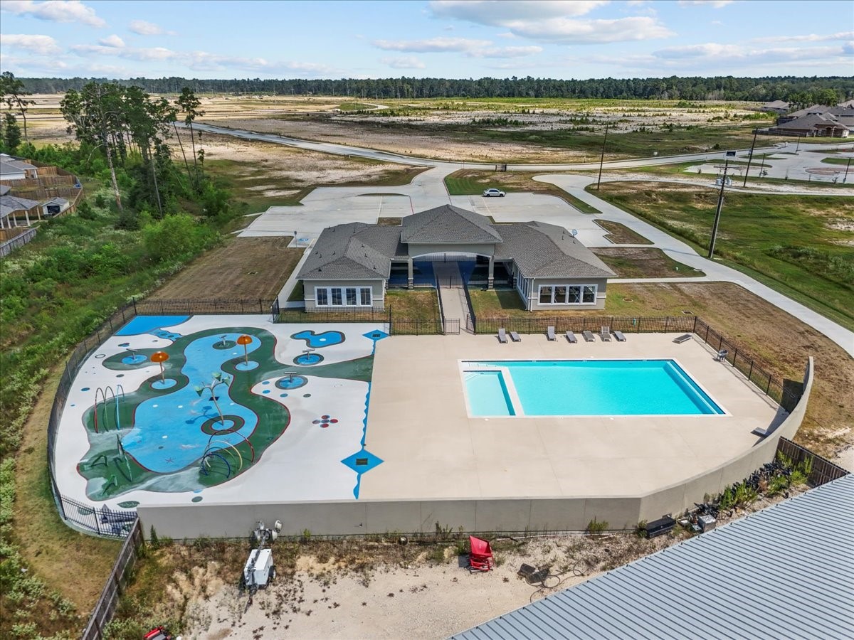 20061 Torrey Pines Lane Cleveland, TX 77327 - Photo 39 of 41 an aerial view of a house with outdoor space