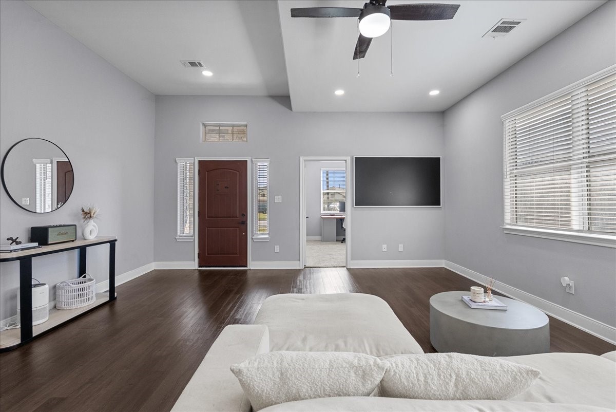 20061 Torrey Pines Lane Cleveland, TX 77327 - Photo 7 of 41 a living room with furniture and a flat screen tv