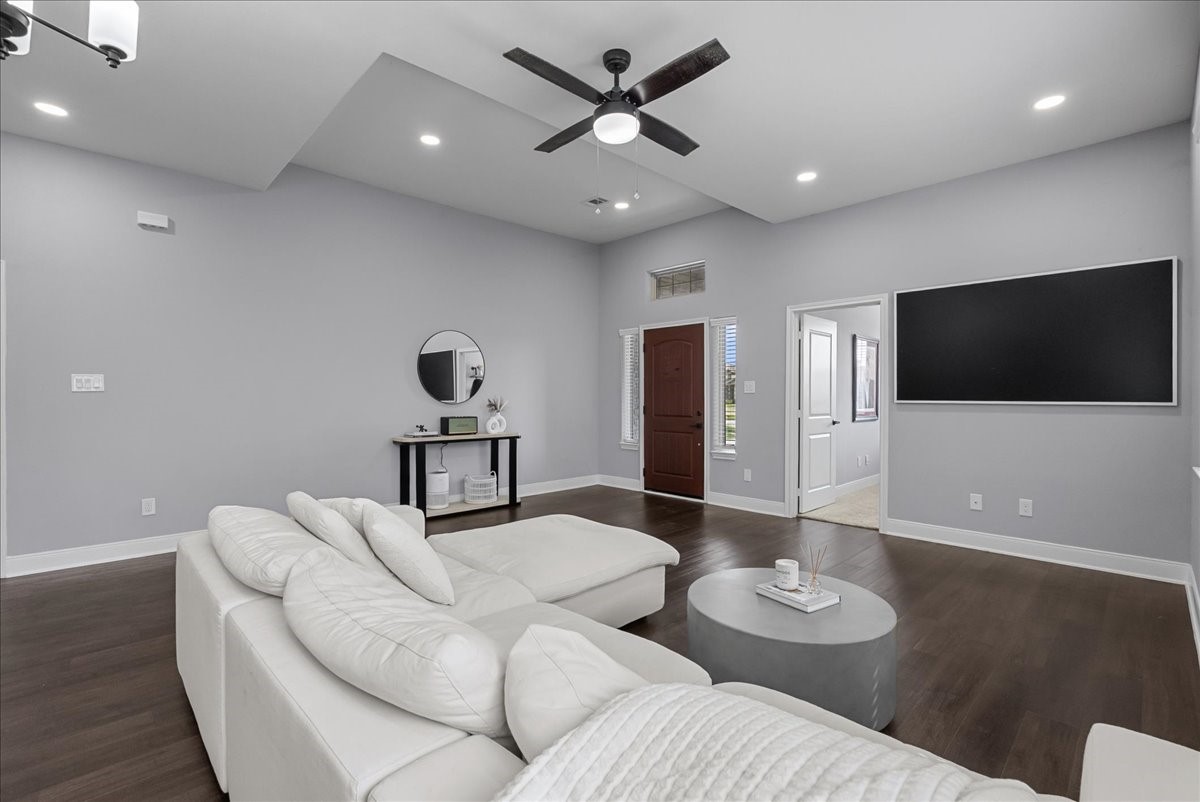 20061 Torrey Pines Lane Cleveland, TX 77327 - Photo 8 of 41 a living room with furniture and a flat screen tv