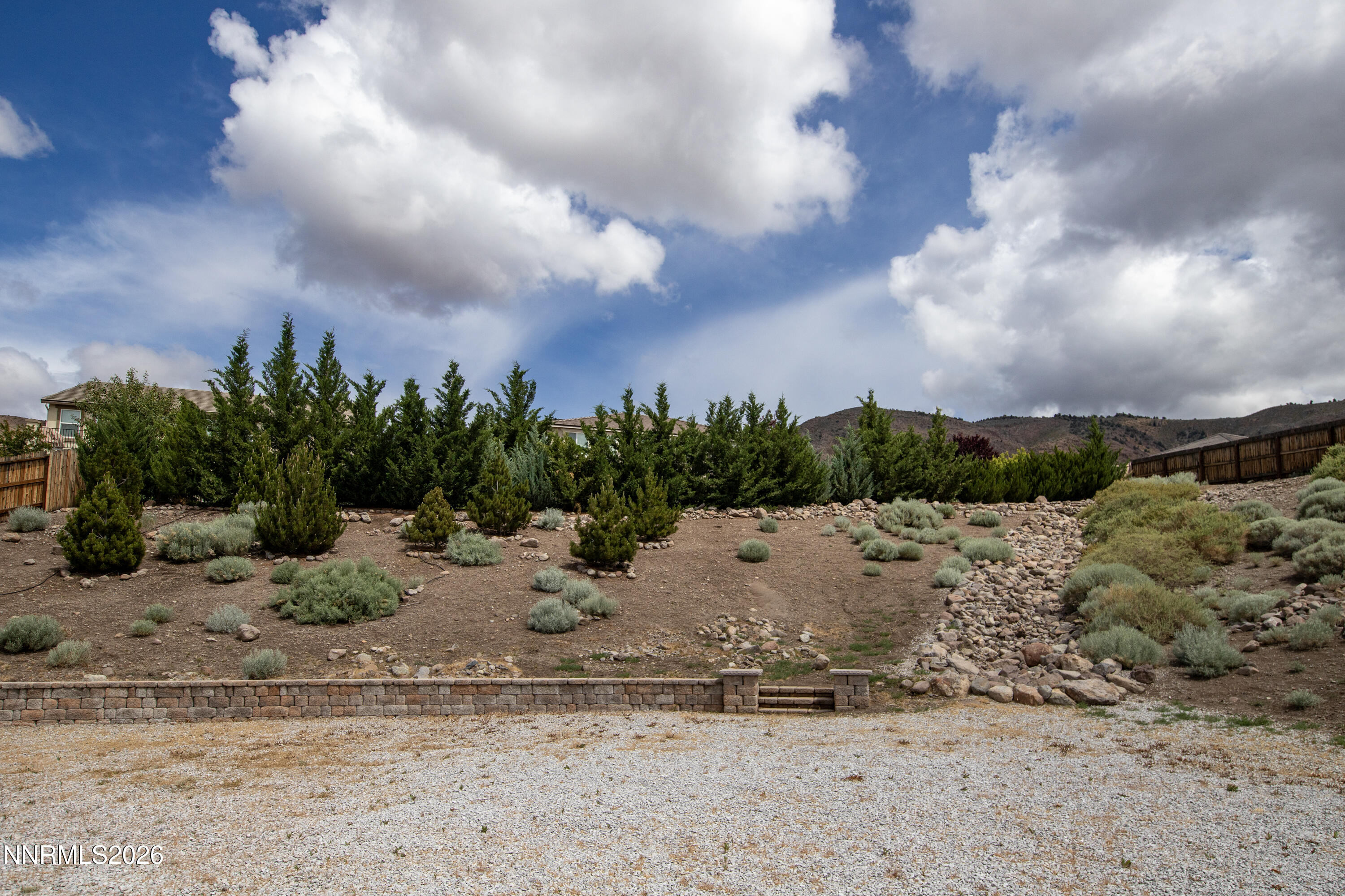 10150 Barrel Racer Drive Reno, NV 89521 - Photo 58 of 64 a view of a dry yard with lots of green space
