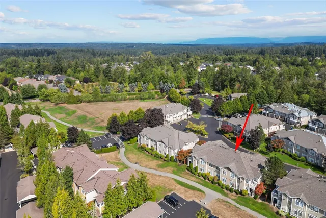 an aerial view of a city with lots of residential buildings
