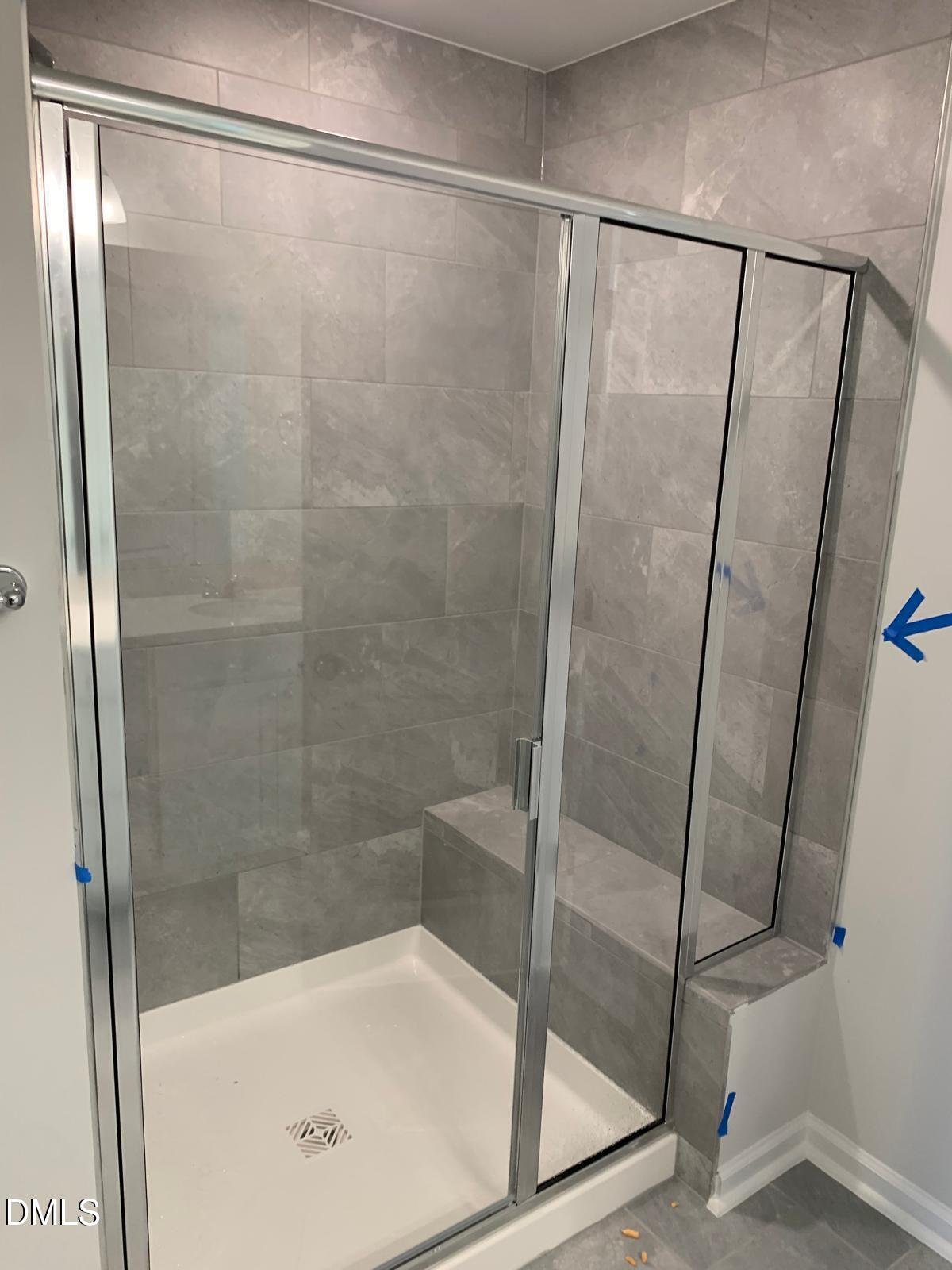 233 Broomside Avenue Raleigh, NC 27603 - Photo 17 of 18 a bathroom with a shower
