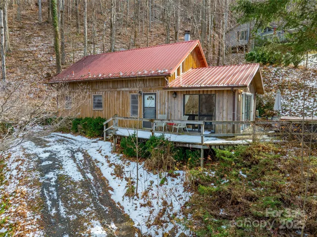 a front view of a house with swimming pool