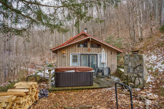 a front view of house with a garden