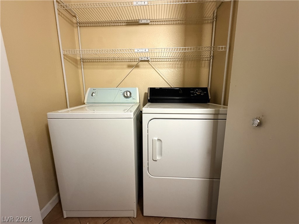 4955 South Lindell Road, Unit 203 Las Vegas, NV 89118 - Photo 24 of 31 A dedicated laundry space provides optimal functionality and convenience.