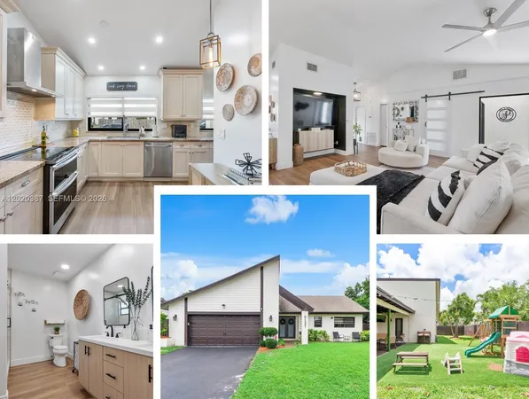 a kitchen with kitchen island stainless steel appliances a stove refrigerator sink and cabinets