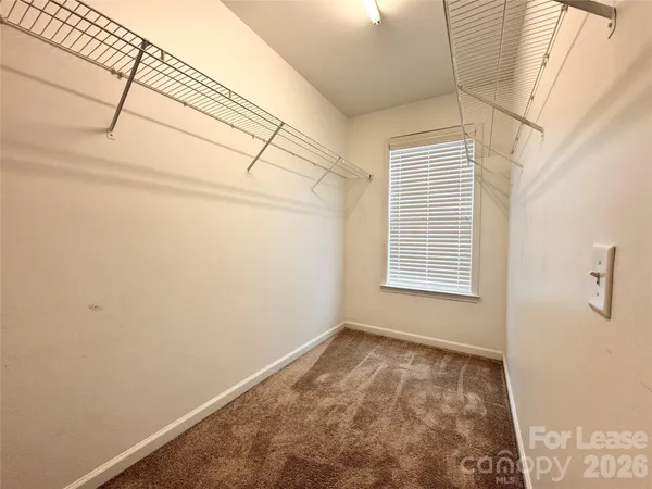 a view of a room with a window