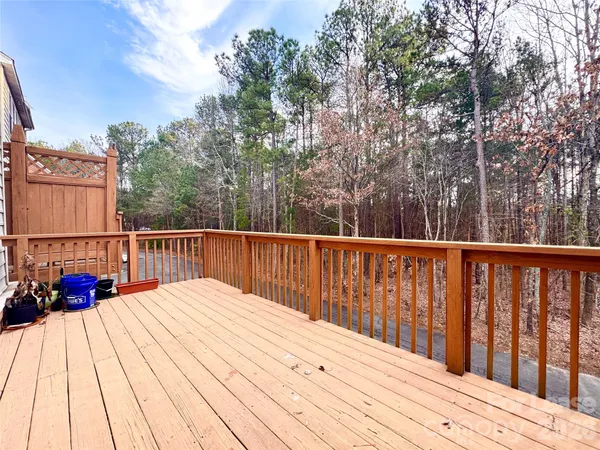 a view of balcony and wooden floor