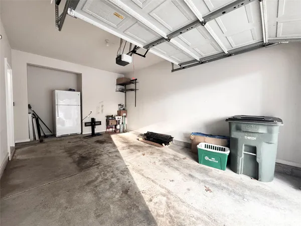 a bedroom with a bed and furniture