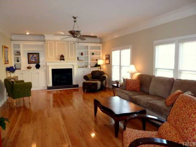 This Spacious Family Room has Gorgeous Hardwood Floors, Built-in Bookcases and Beautiful Crown Molding. . Den/Family/Great Room