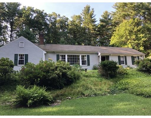 78 Draper Road Wayland, MA 01778 - Photo 1 of 10 a front view of a house with a garden