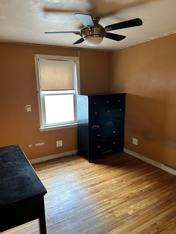 27 Evans Road Stoneham, MA 02180 - Photo 9 of 10 a view of an empty room and window