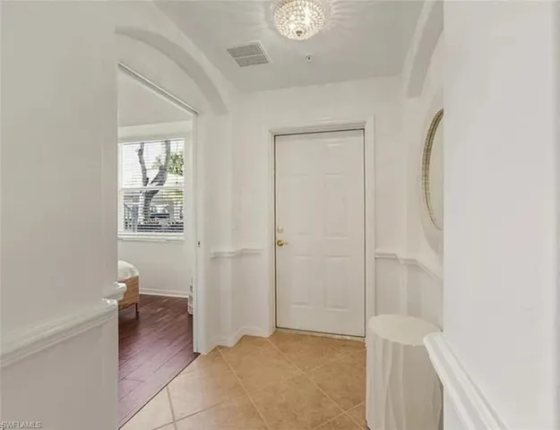 a view of livingroom with hardwood floor and a ceiling fan