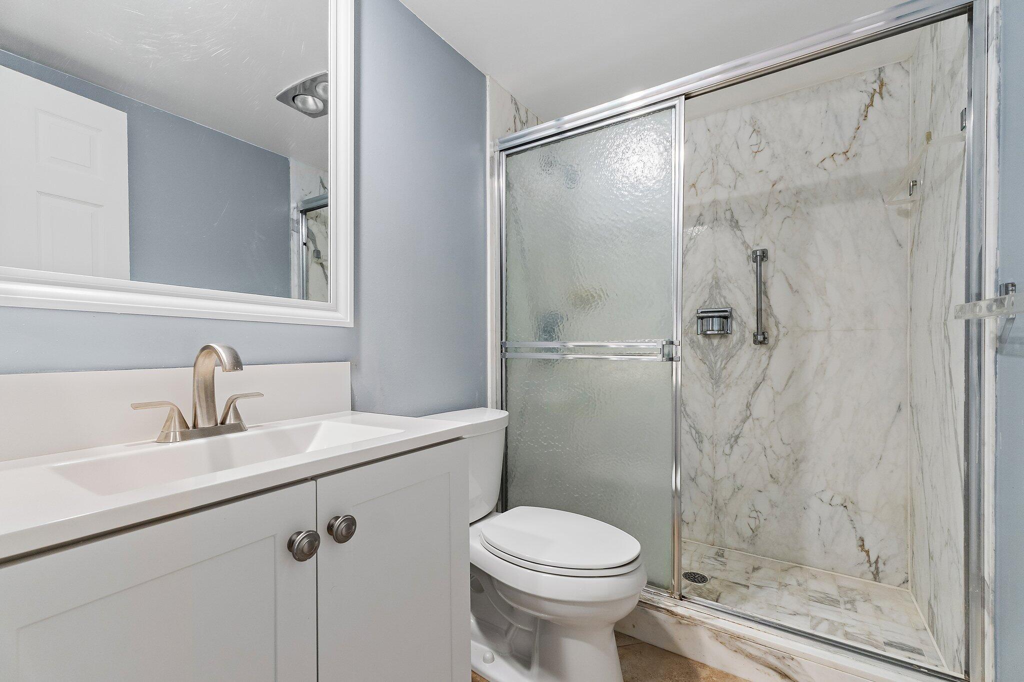 375 South Beach Road, Unit 201 Tequesta, FL 33469 - Photo 15 of 35 Guest Bath