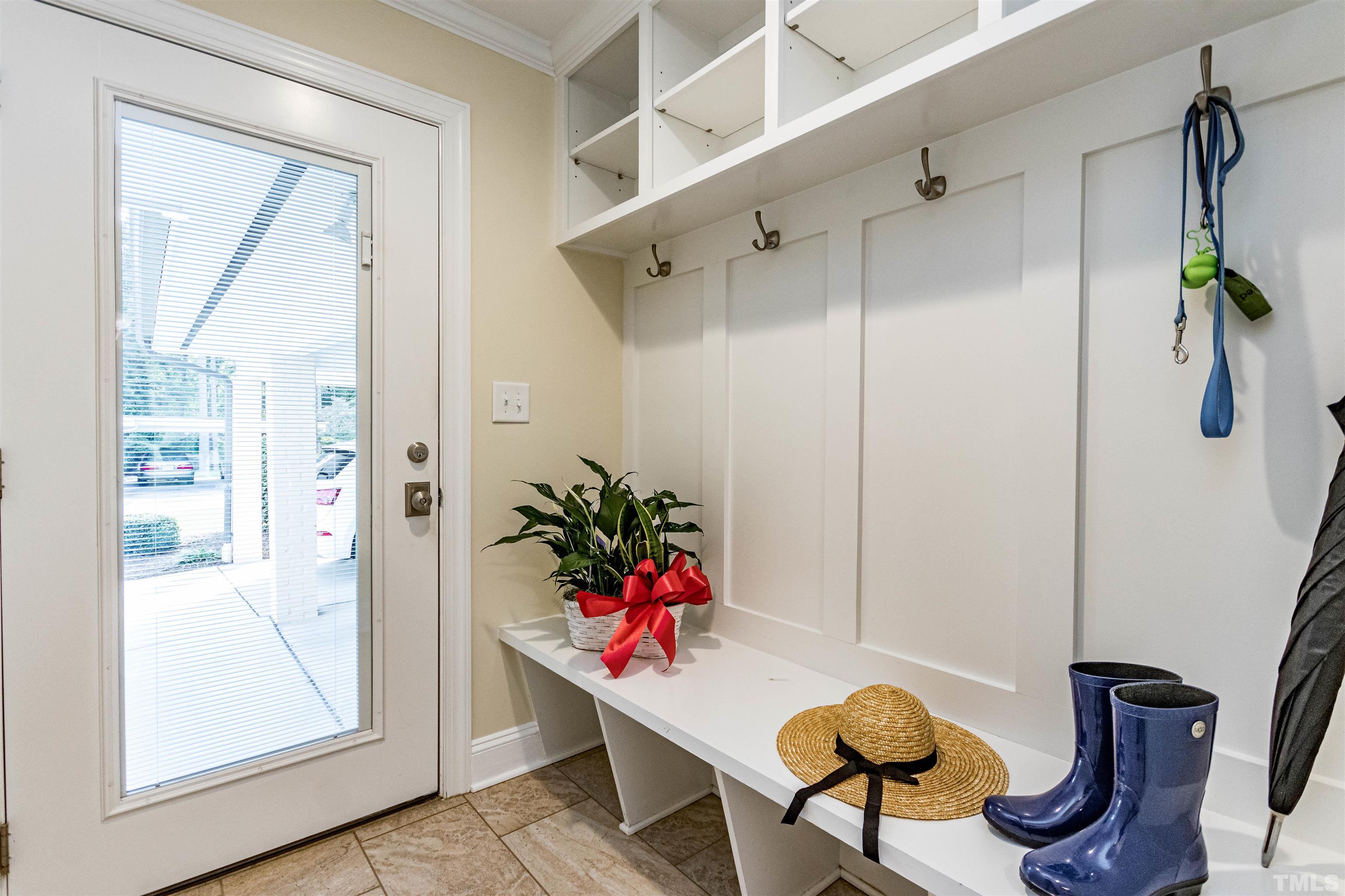 1509 Lutz Avenue Raleigh, NC 27607 - Photo 15 of 30 a room with furniture and potted plant