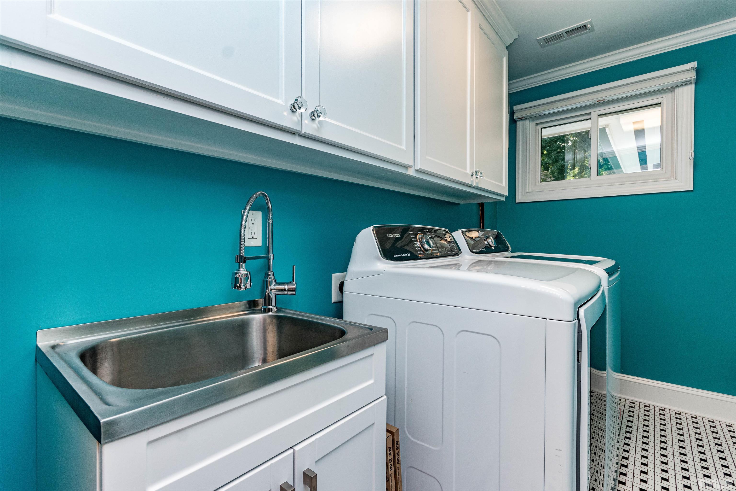 1509 Lutz Avenue Raleigh, NC 27607 - Photo 16 of 30 a utility room with dryer and washer