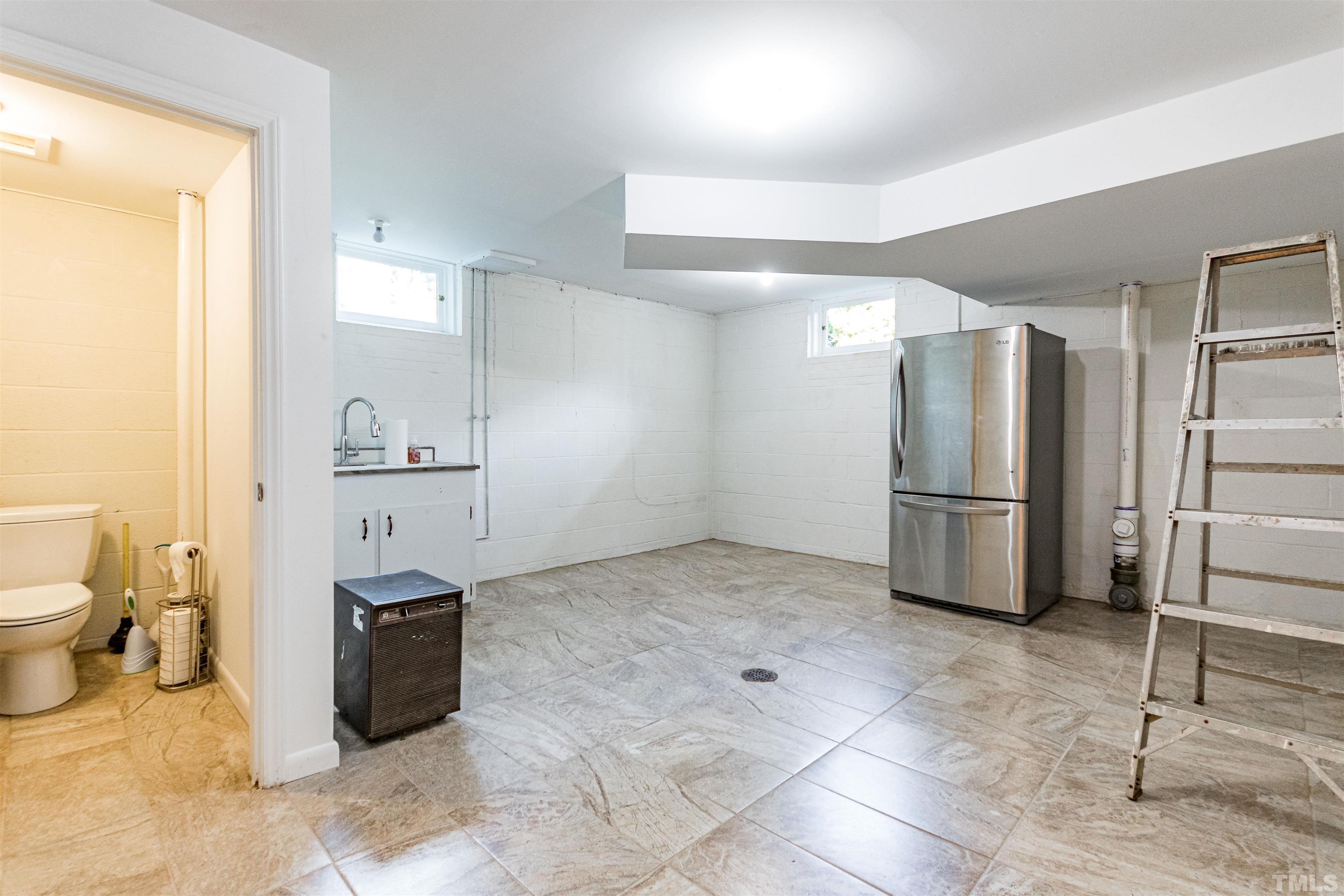 1509 Lutz Avenue Raleigh, NC 27607 - Photo 27 of 30 a view of a kitchen with a sink