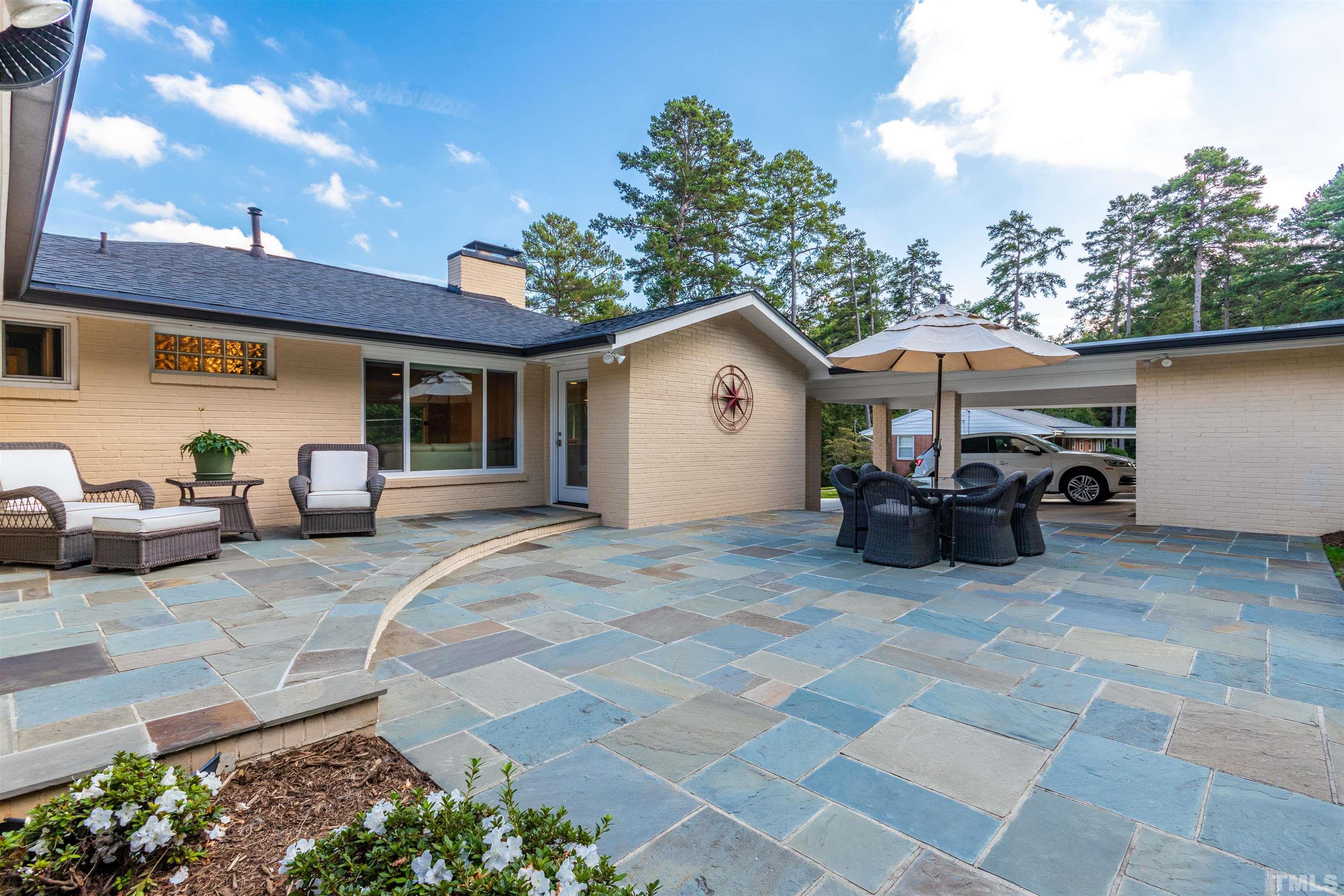 1509 Lutz Avenue Raleigh, NC 27607 - Photo 29 of 30 a view of a house with backyard and sitting area