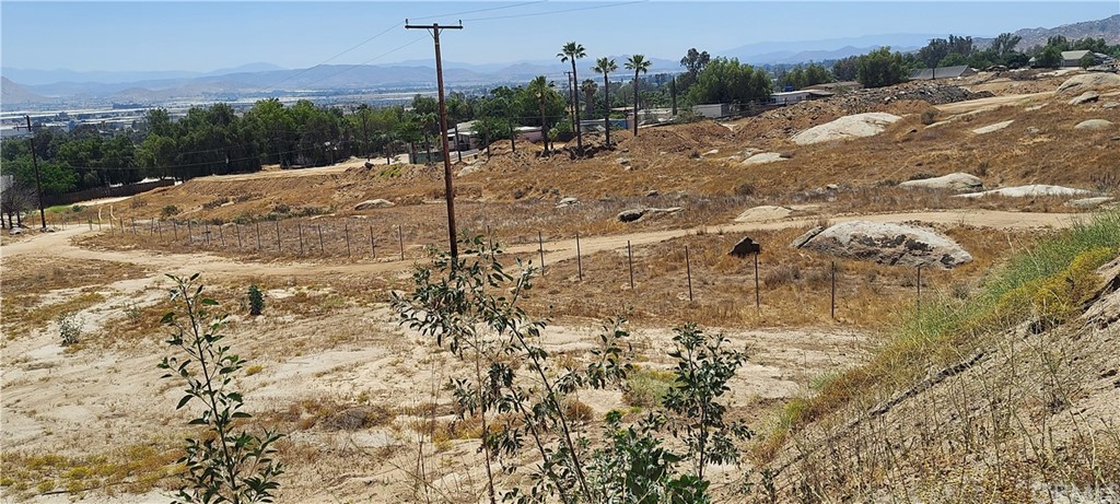 0 Darin Perris Ca Perris, CA 92570 - Photo 12 of 17 a view of a dry yard with trees