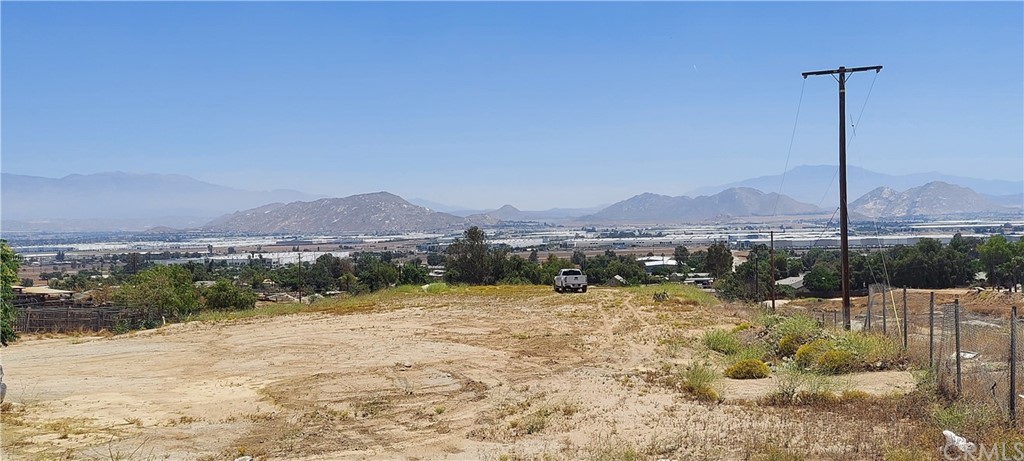0 Darin Perris Ca Perris, CA 92570 - Photo 4 of 17 a view of a lake with a mountain in the background