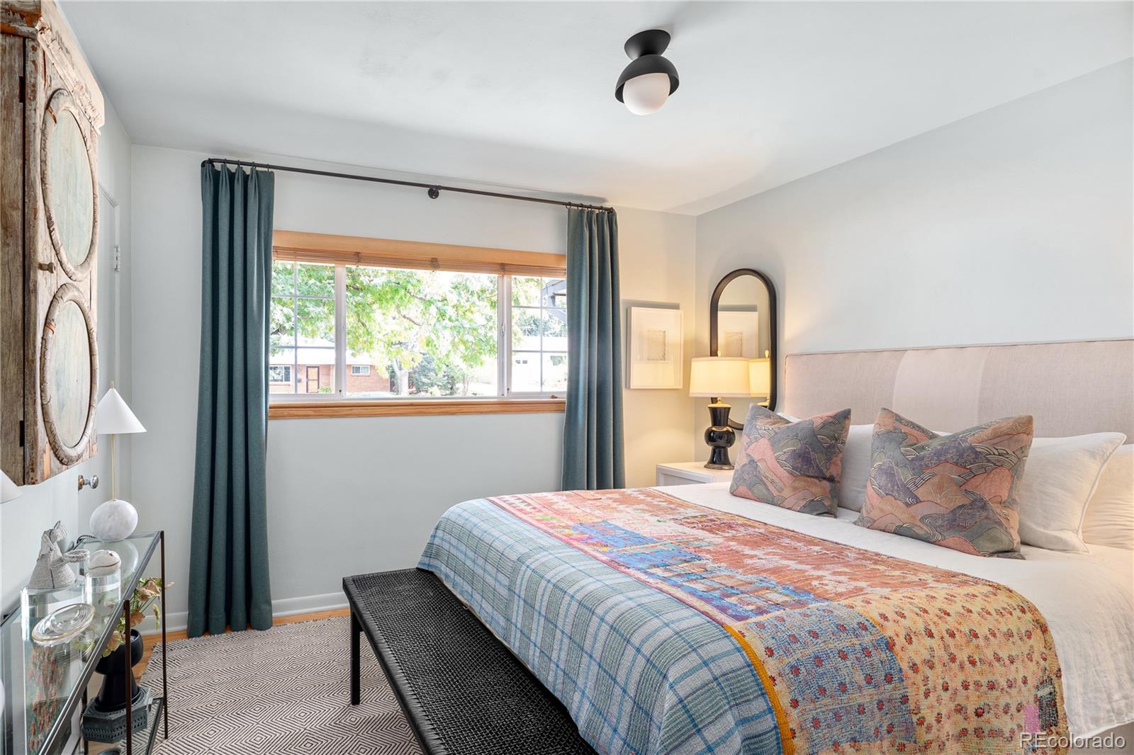 4225 Balsam Street Wheat Ridge, CO 80033 - Photo 24 of 33 a bedroom with a bed and a window