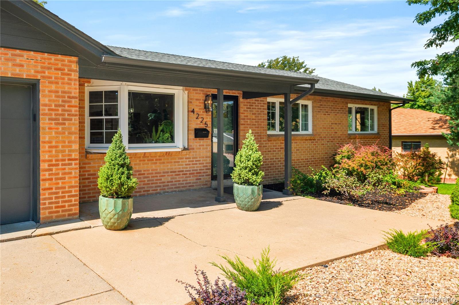 4225 Balsam Street Wheat Ridge, CO 80033 - Photo 3 of 33 a front view of a house having yard