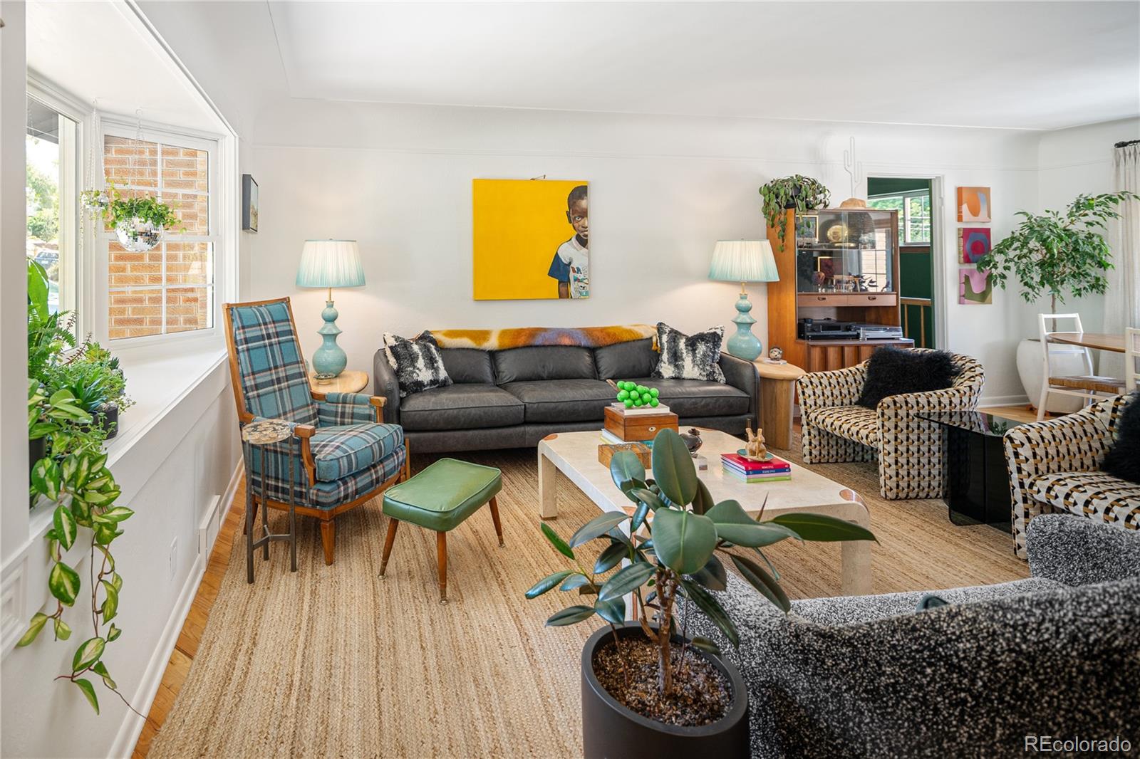 4225 Balsam Street Wheat Ridge, CO 80033 - Photo 4 of 33 a living room with furniture and a wooden floor